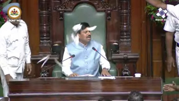 BJP MLAs were already in the well of the House on a protest when things went out of control. Credit: Screengrab/ NIC webcast BJP MLAs were already in the well of the House on a protest when things went out of control. Credit: Screengrab/ NIC webcast